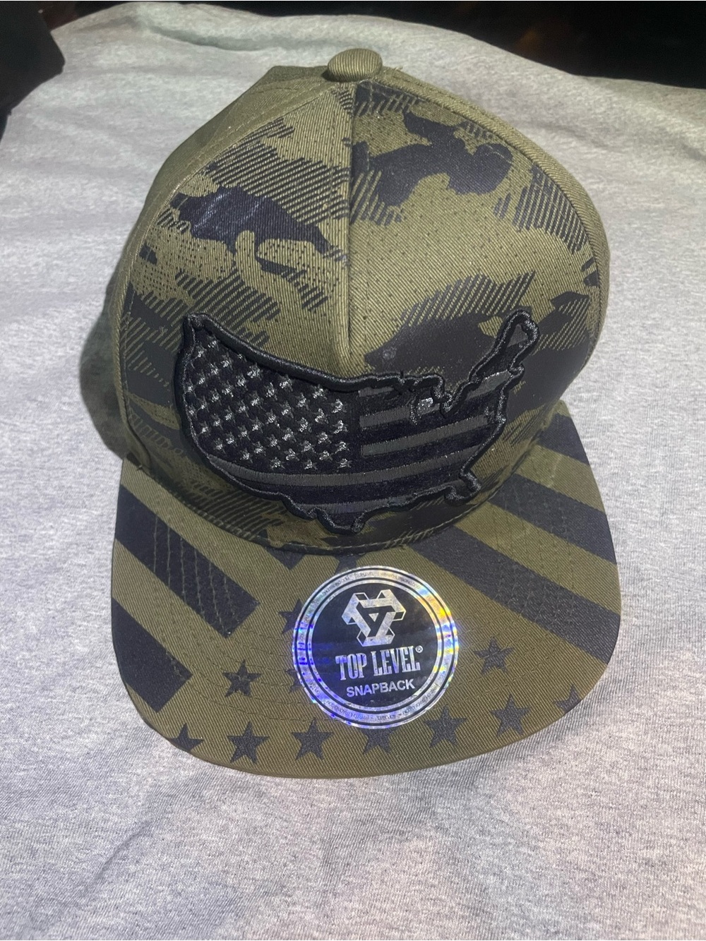 Top Level Olive Green Camo Snapback Hat with Black Flag Patch